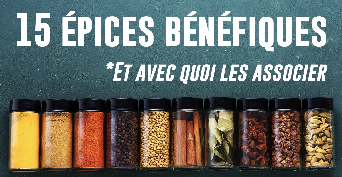 Mélange d'épices colorées dans un bol en céramique sur une table en bois rustique